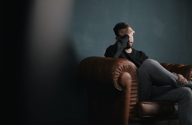 Counselling for Men. Man on Sofa